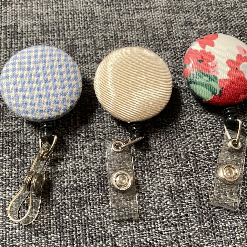 Three Badge Holders.